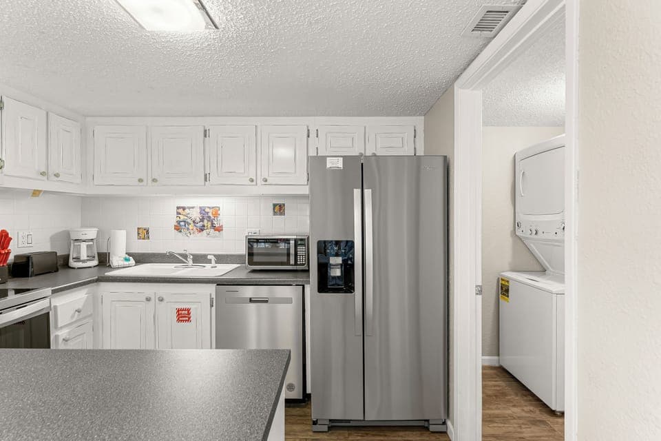Kitchen - You have an open kitchen concept, which is perfect for having conversations while you cook.