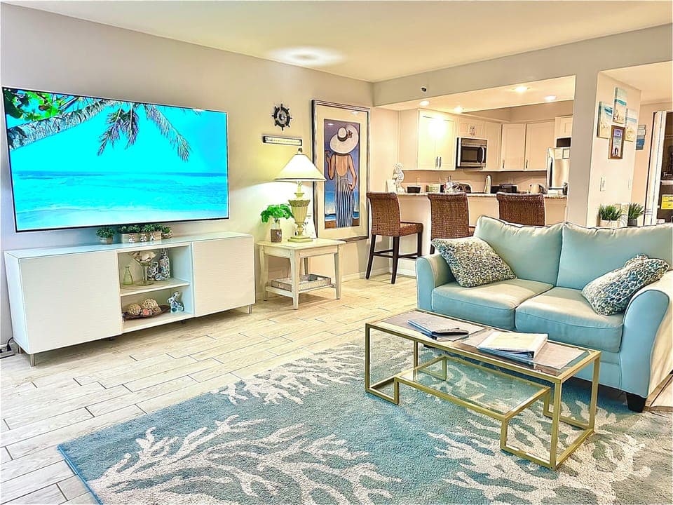 Comfortable bar seating, sleeper-sofa, loveseat. 
