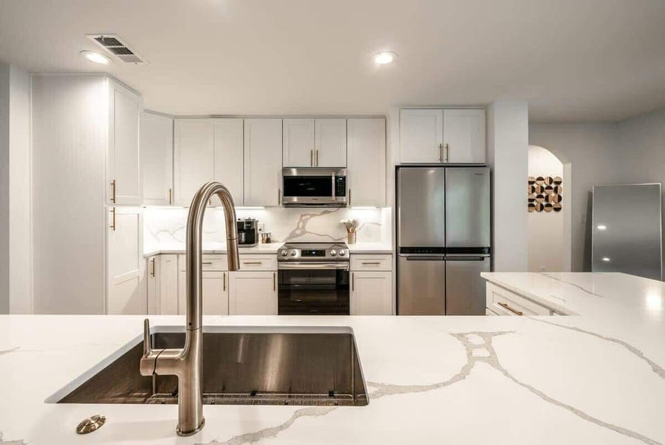 A sleek modern kitchen crafted for high-end culinary experiences.