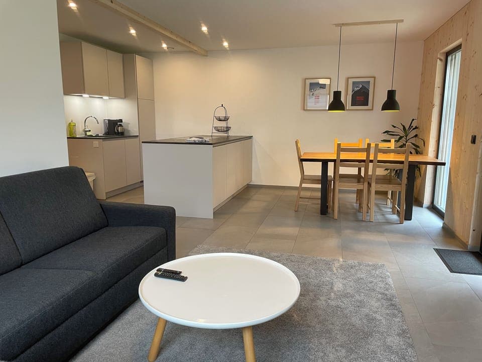 The apartment features a bright, open-plan kitchen and living area – perfect for cooking and relaxin