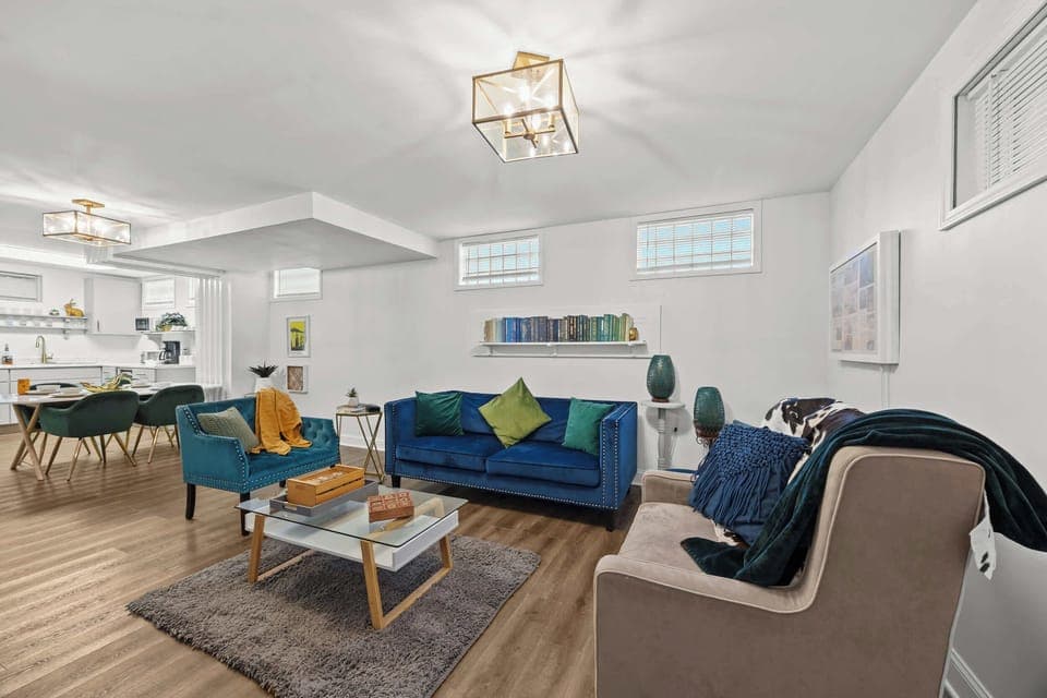 Living Room: Unit 8 - Bright and inviting living space, perfect for relaxing and connecting.