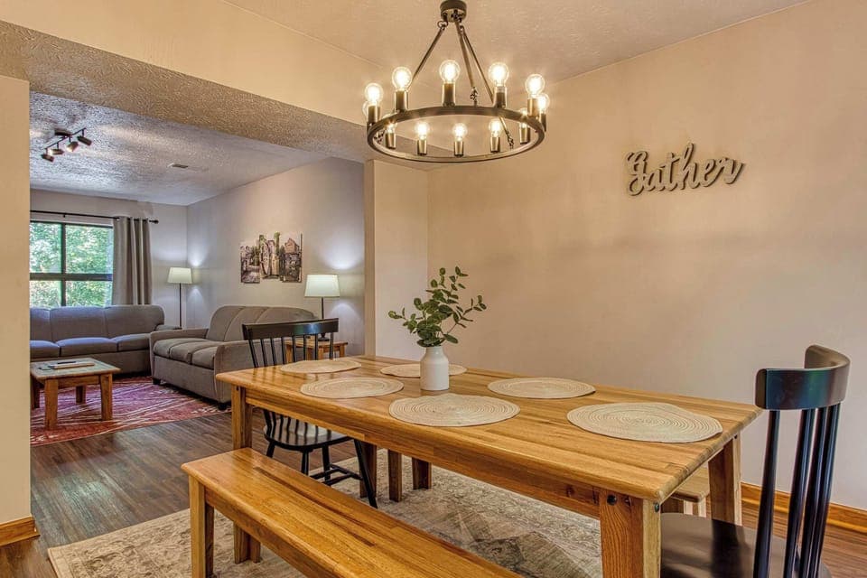 Our beautifully designed open-concept kitchen and dining area offers the perfect space for gathering with loved ones.
