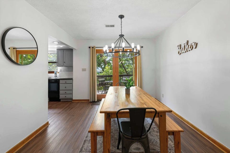 Enjoy meals around the spacious table with beautiful forest views just outside!