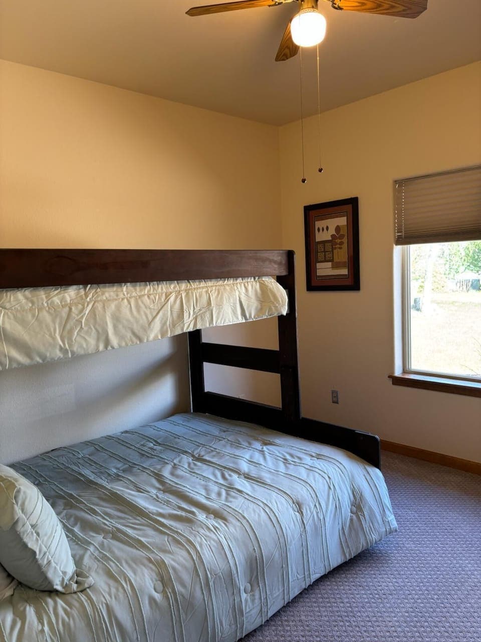Third bedroom facing front yard, black out blinds