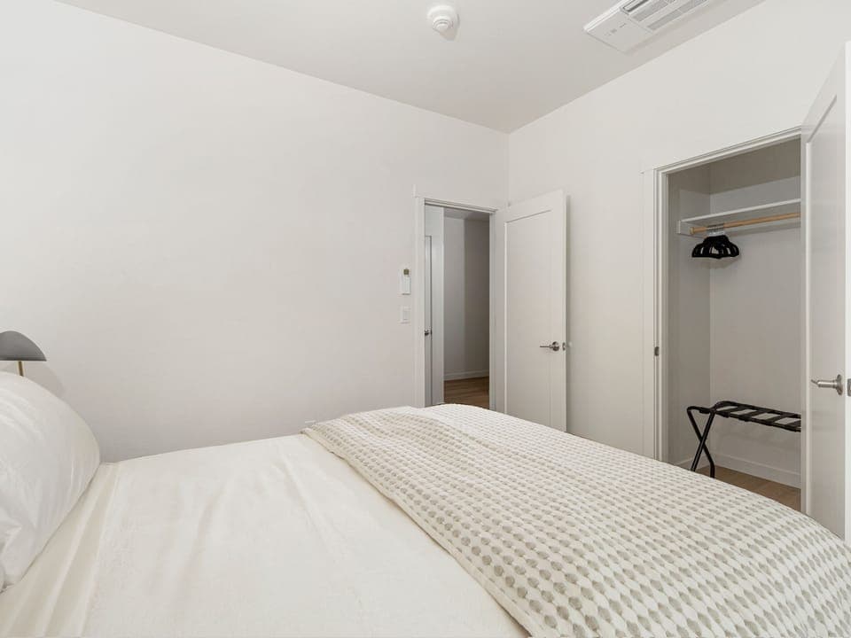 Bedroom #2: Queen bed with a full bathroom located directly across the hallway.