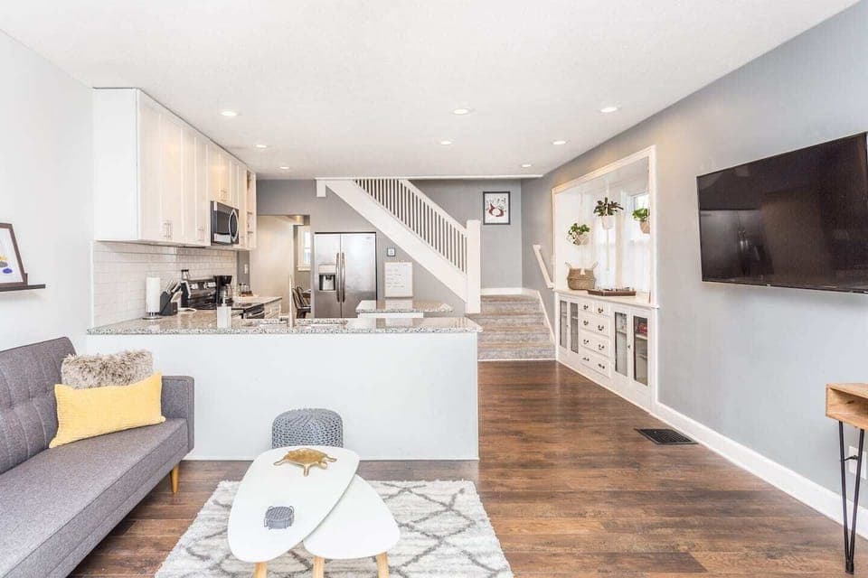 Each living room has a stylish sectional with 55" smart TV