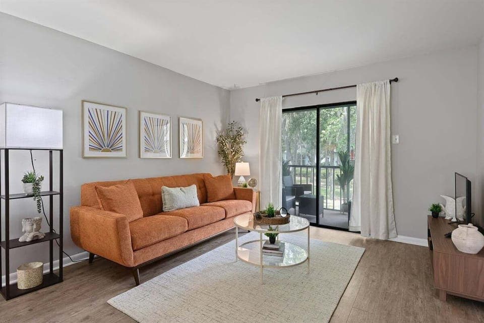 Unwind in this inviting living room, where soft seating meets a smart TV—perfect for movie nights or catching up on your favorite shows.