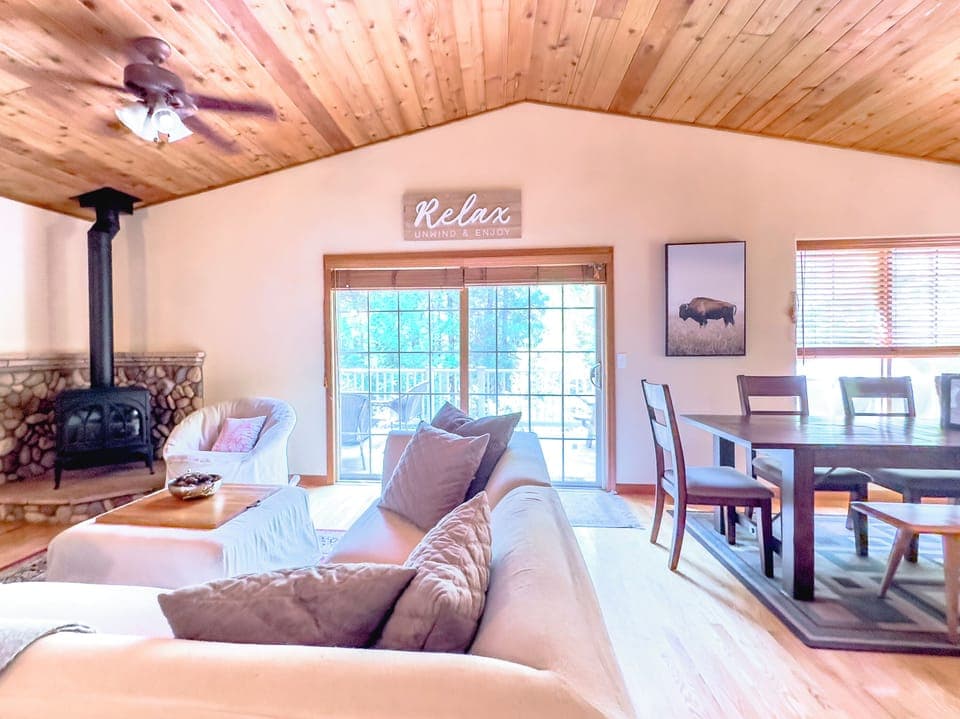 Charming wood panel ceiling gives a warm ambience in the relaxing great room