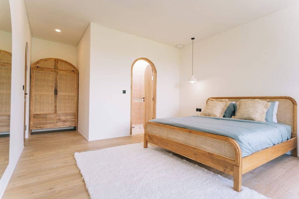 2nd bedroom upstairs with wardrobe, hanger and en suite bathroom