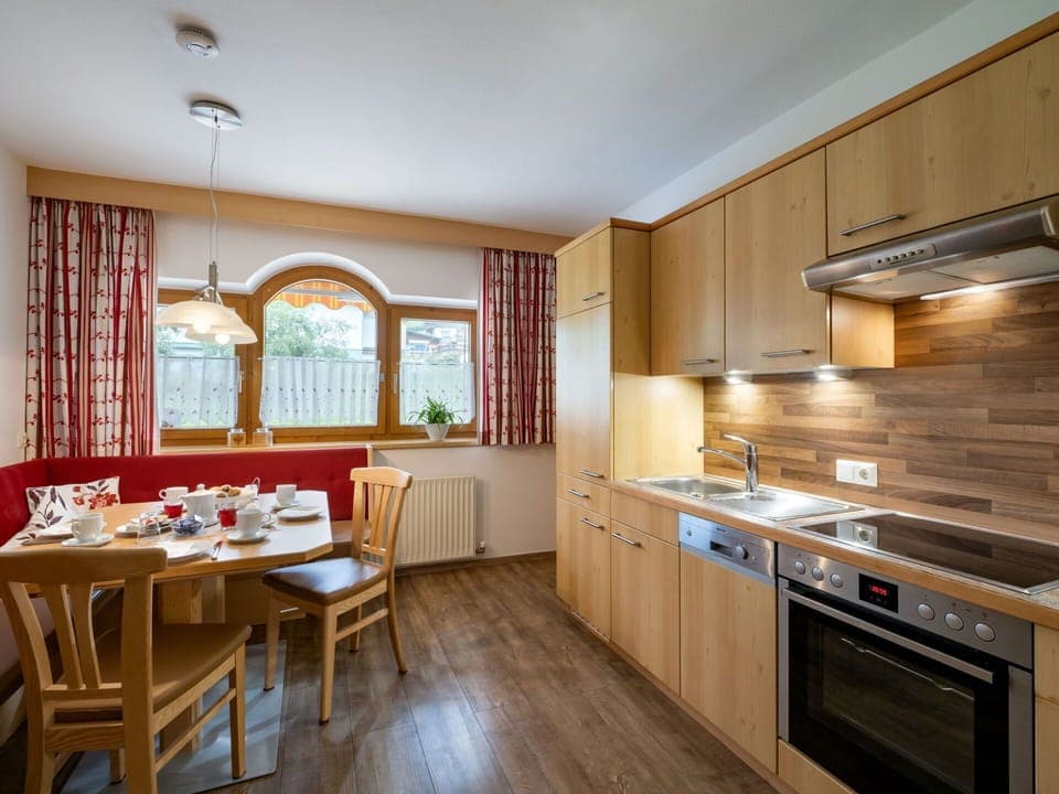 Interior Design, Flooring, Floor, Kitchen, Ceiling, Apartment, Room, Countertop, Cabinetry, Wood Stain