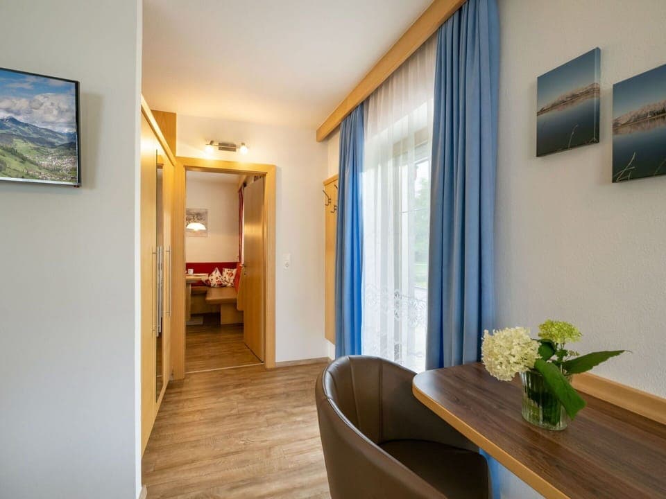 Interior Design, Apartment, Home, Furniture, Ceiling, Chair, Wood Stain, Hotel, Houseplant, Hardwood