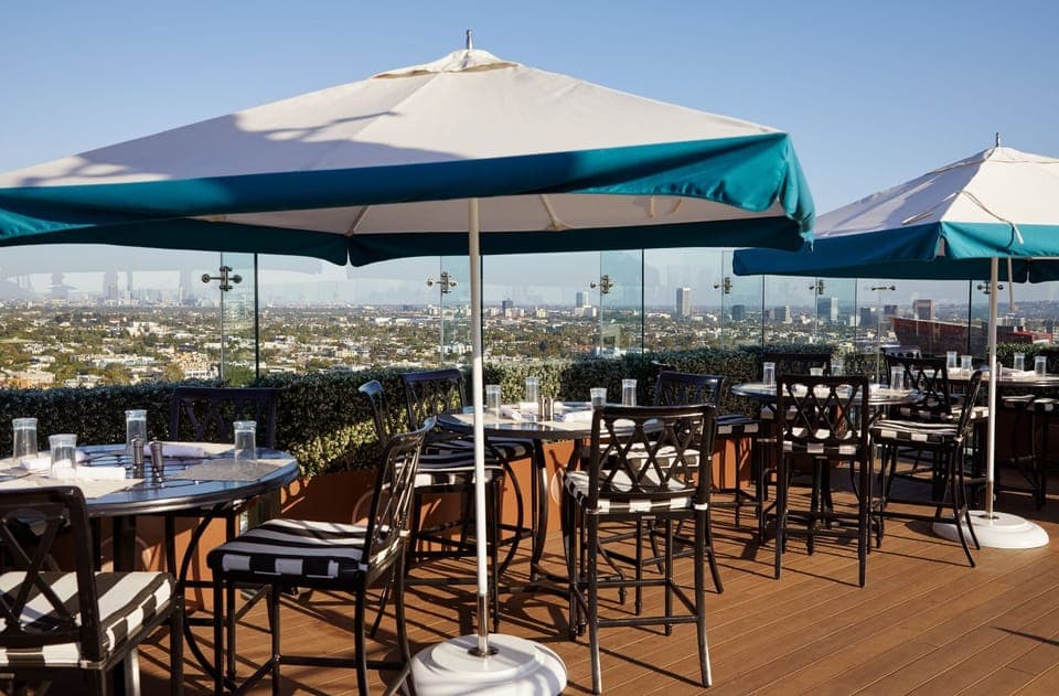 Sip cocktails al fresco with sweeping skyline views overhead.