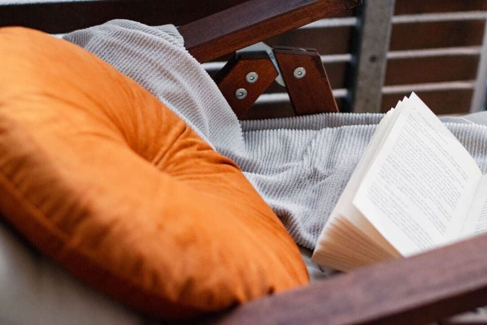 Lose yourself in your favorite book while enjoying the fresh air on the balcony.