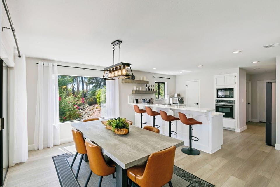 Dining room (seats 6) and bar area.