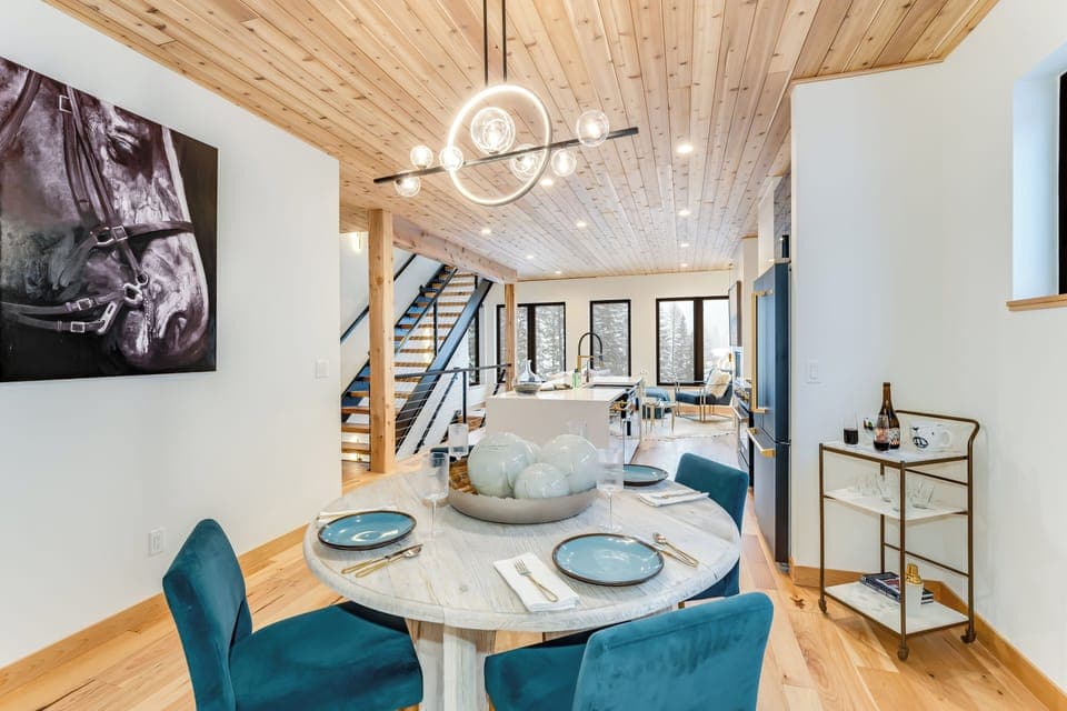 Dining room table seating for four people | Upper Level