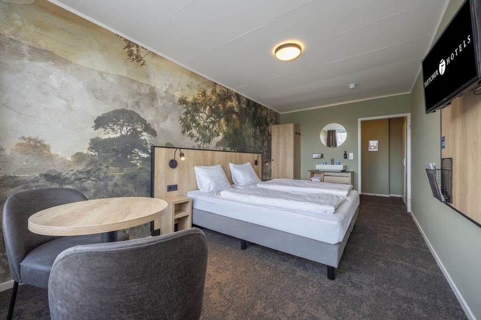 Unit with 2 Single beds. Exact unit will be assigned upon arrival. Views, colors, and decor may vary.