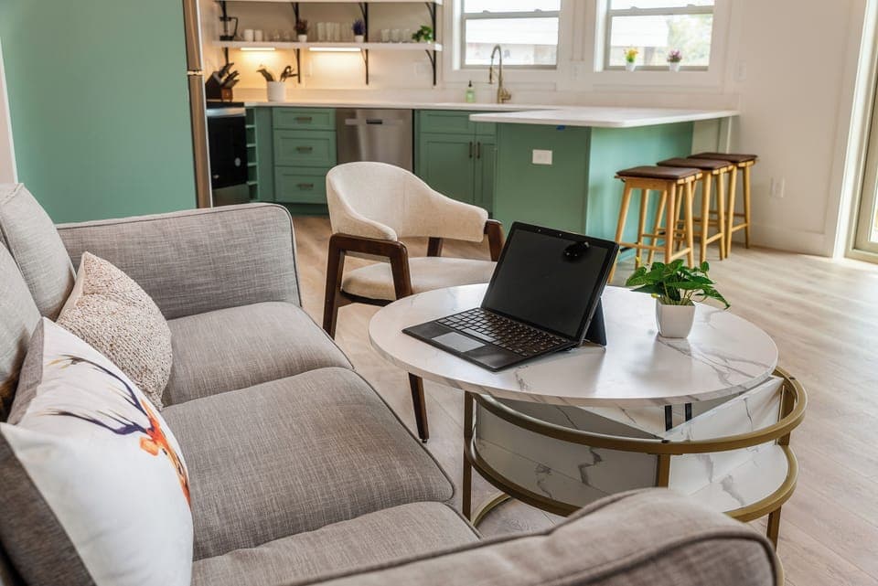 Coffee table lifts up for use as a workstation (laptop not included).