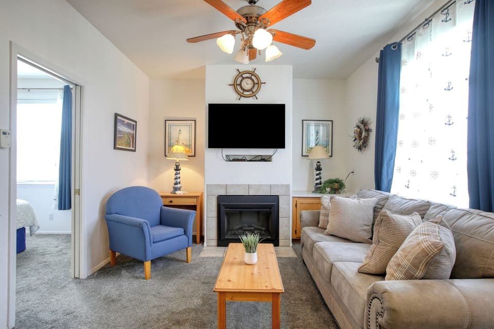 This charming one-bedroom condo features a king bed, full kitchen, private patio, and shared hot tub and BBQ access — all just a short stroll from the sun and shore.