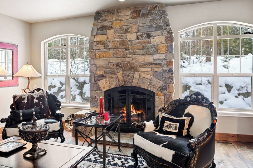 Cozy Living Room with Wood Burning Fireplace and TV with Cable