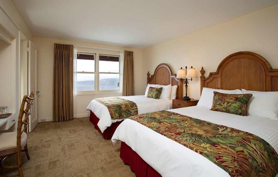 Unwind together in crisp linens and a calm coastal palette