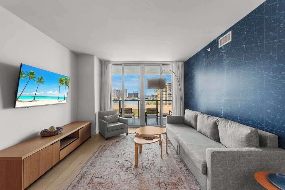 From the living room, step onto the connecting balcony to enjoy waterfront panoramas and beautiful sunsets.