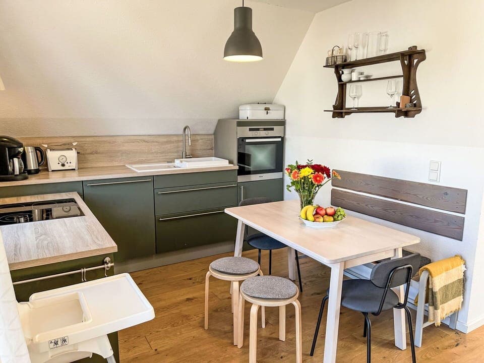 Furniture, Flooring, Wood, Interior Design, Floor, Kitchen, Countertop, Wood Flooring, Lighting, Kitchen Appliance