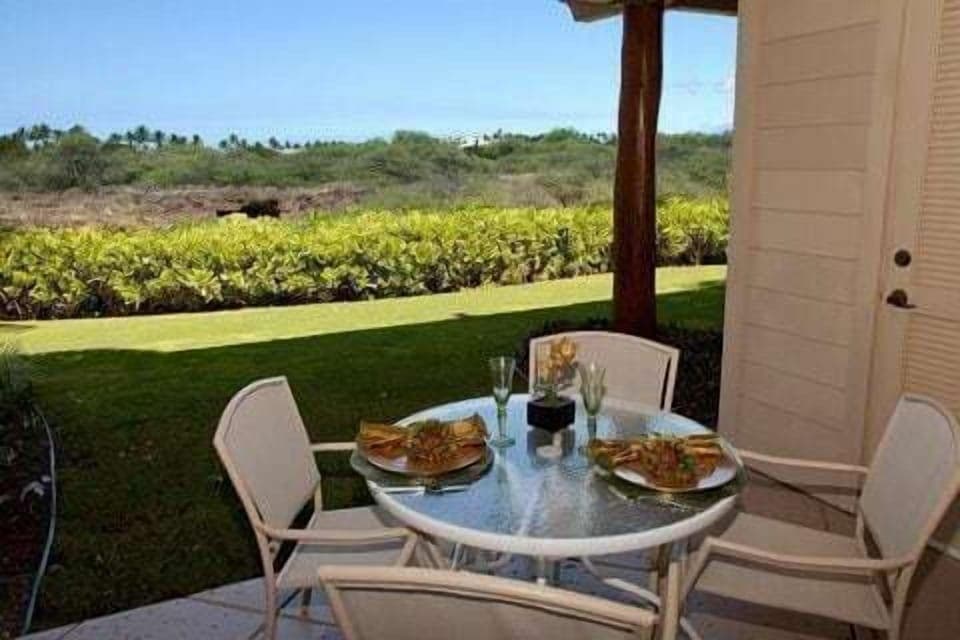 Enjoy al fresco meals on your private patio, with panoramic views of lava fields and beautiful greenery.