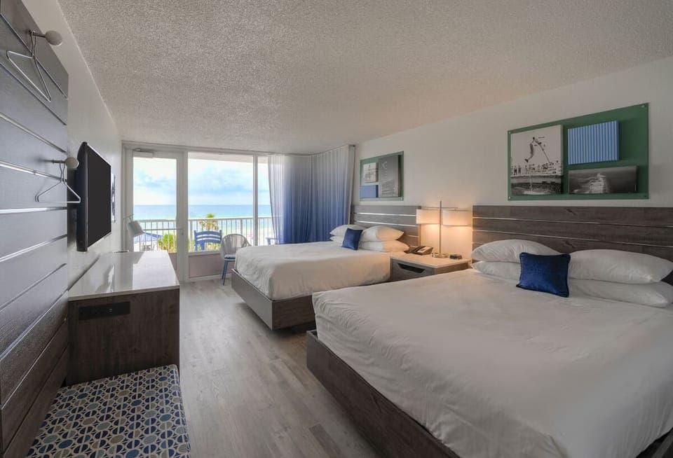 Unit with 2 Queen beds. Exact unit will be assigned upon arrival. Views, colors, and decor may vary.