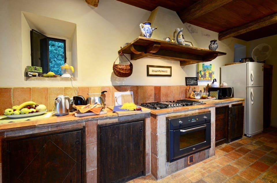Huge stone and wooden made full furnished kitchen 