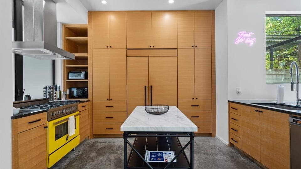 Completely Equipped Kitchen With Modern Appliances And Storage