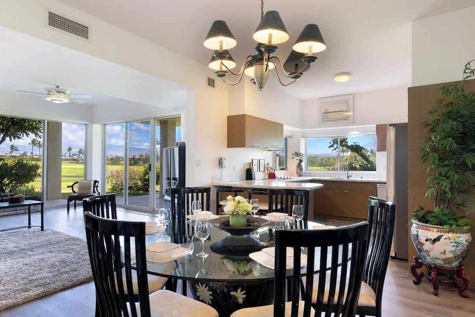 Dine in style with an open concept layout, garden views, and a fully equipped kitchen.