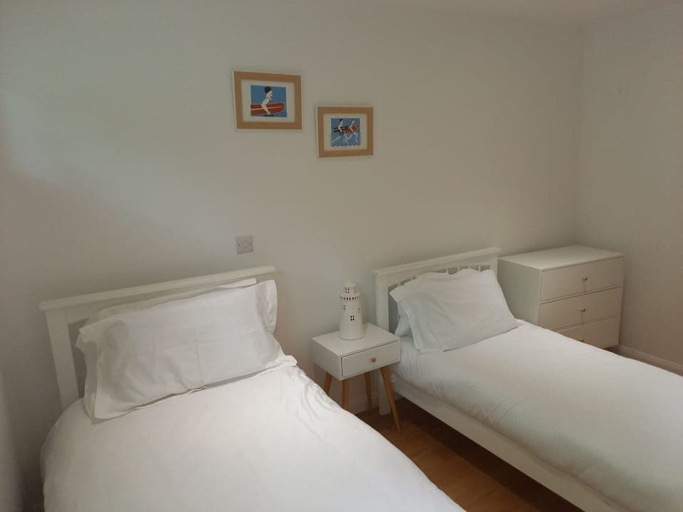 Twin beds in second bedroom