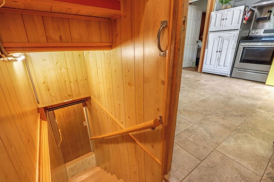 Stairway to the lower level and additional sleeping arrangement