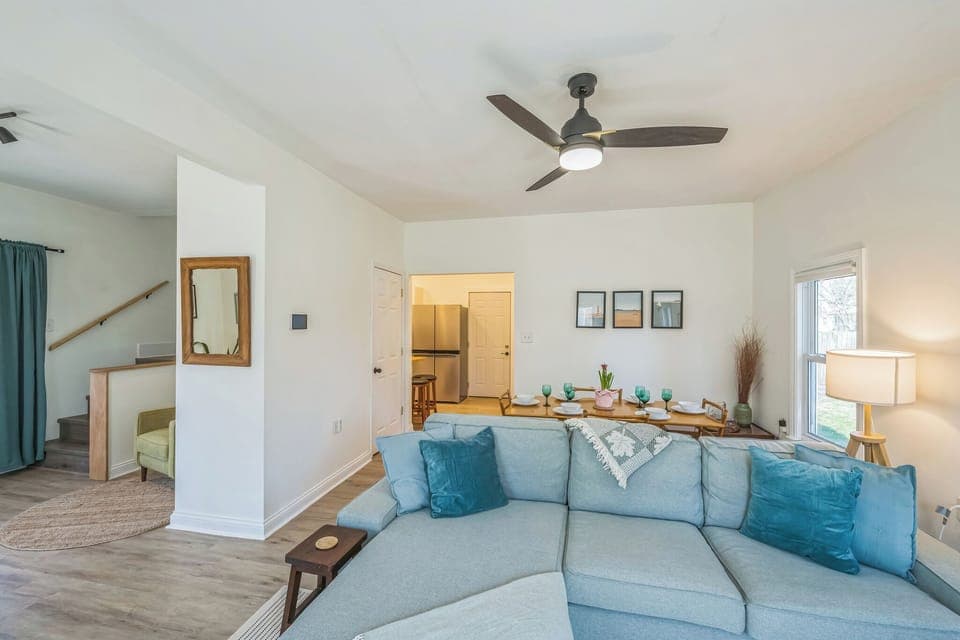 Gather and relax in this open, light-filled living room.