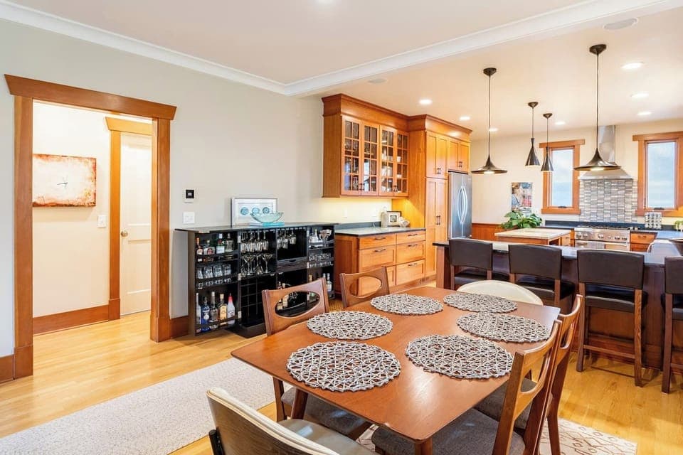 Dining table seats 6 & adjacent bar seats 4.