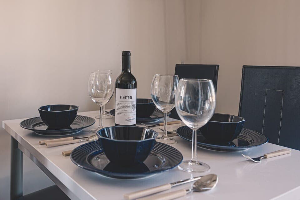 Elegant table for four – perfect for shared meals, evening wine, and cozy family breakfasts.