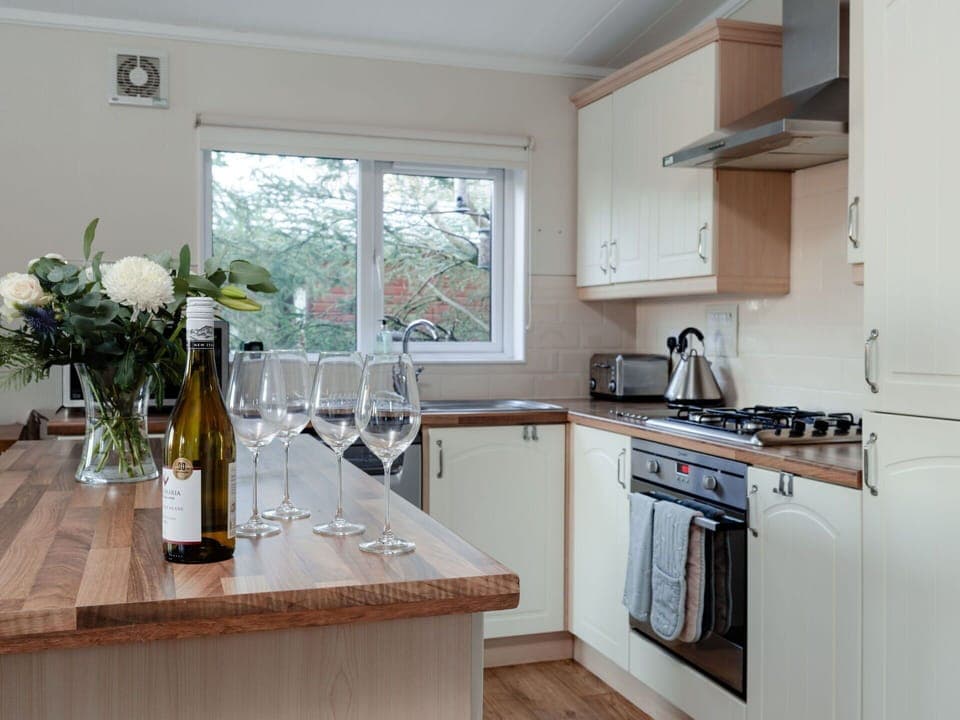 Kitchen, Countertop, Kitchen Appliance, Interior Design, Furniture, Cabinetry, Flooring, Major Appliance, Wood, Home Appliance