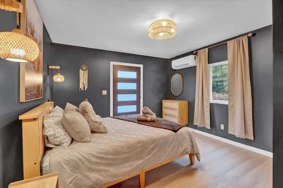 Comfortable Queen Bedroom with Natural Light