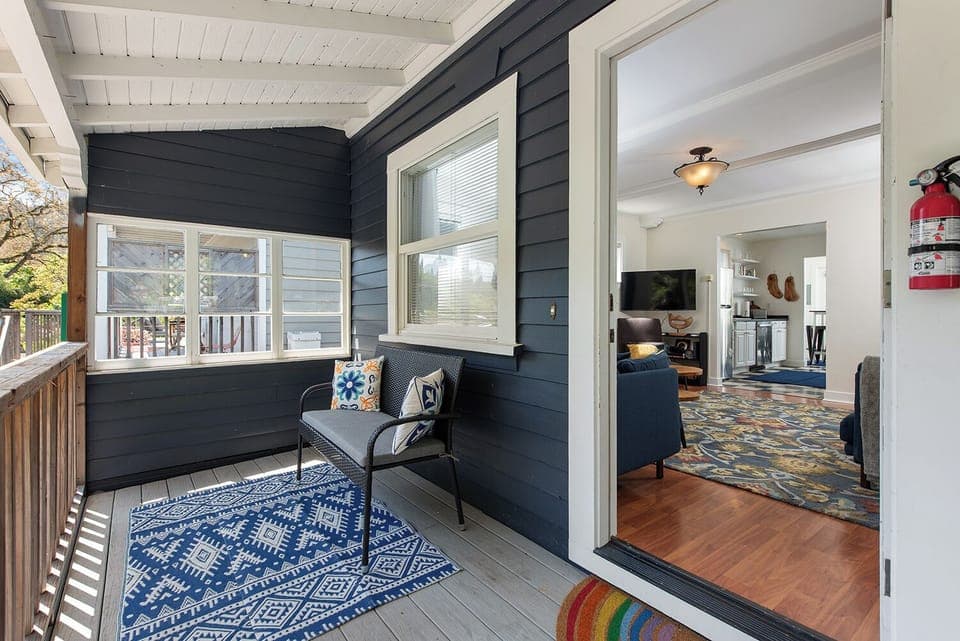 The Cottage: From the front porch to the living room, step into your getaway.