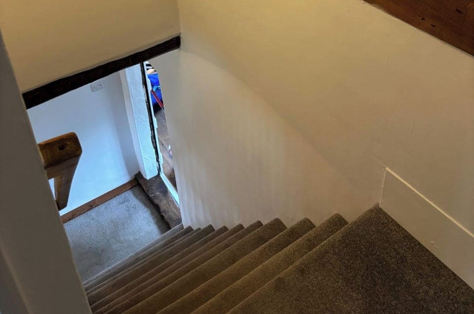 Bedroom 2 and 3 are accessed via the stairs. Due to the nature of the cottage the stairs are steep with limited headroom.
