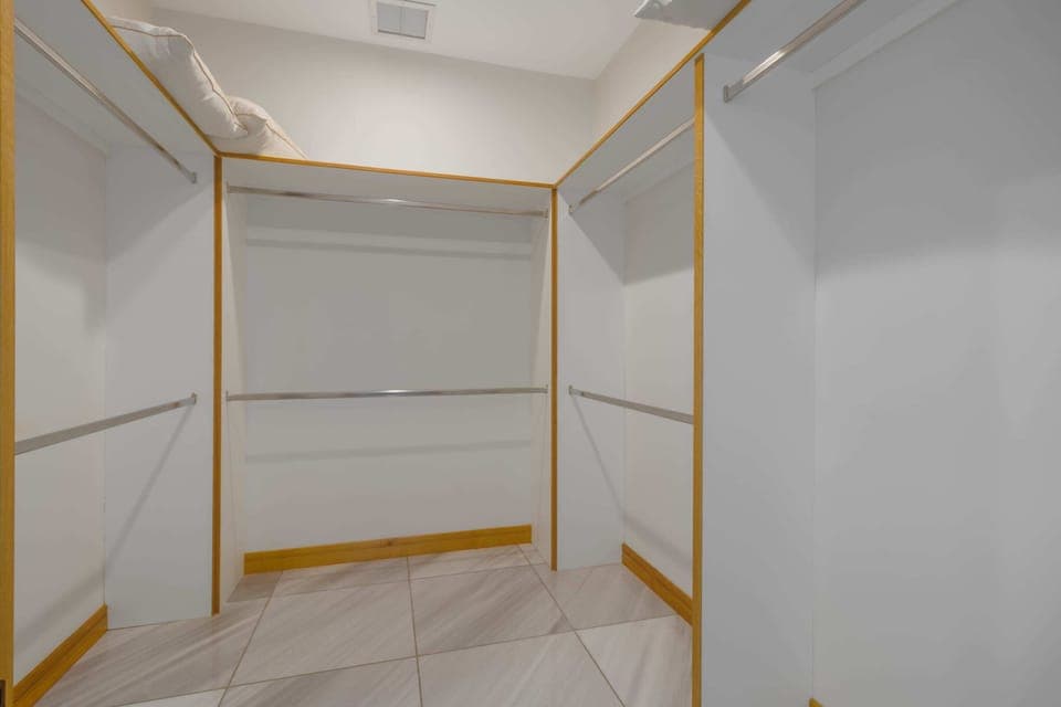 Primary king bedroom spacious walk-in closet.