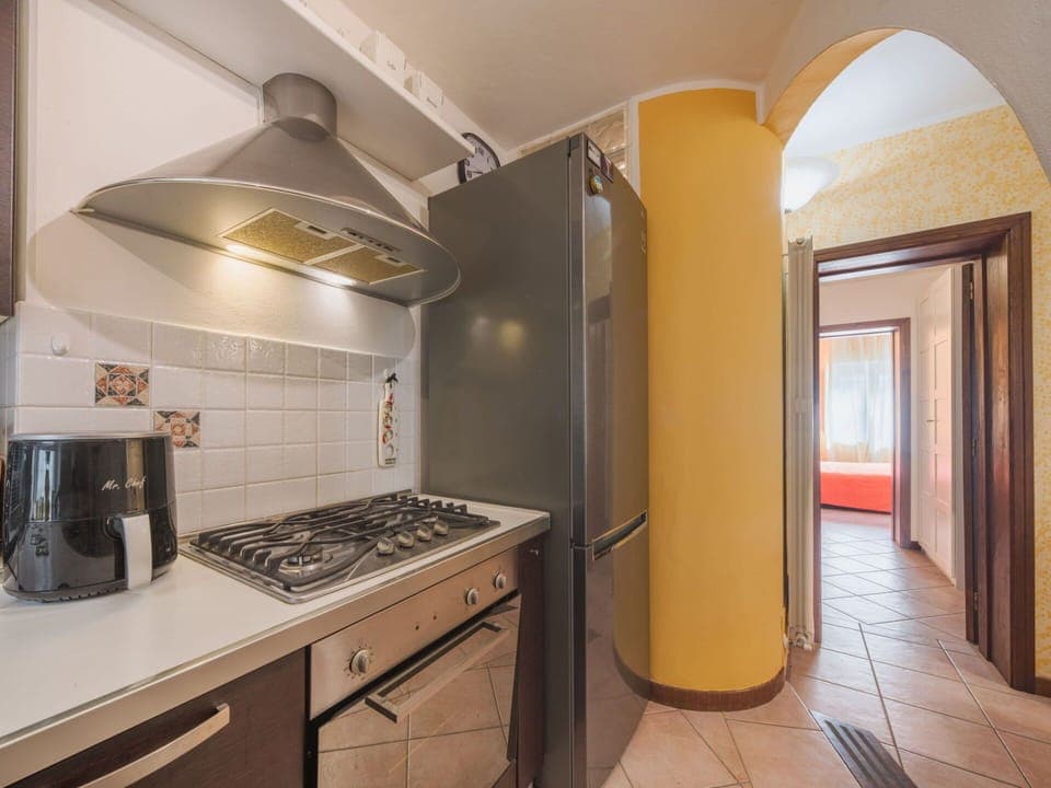 Flooring, Interior Design, Kitchen, Major Appliance, Floor, Ceiling, Countertop, Kitchen Appliance, Room, Lighting