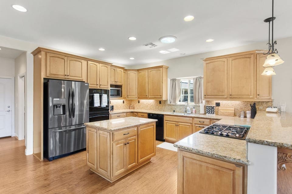 Large kitchen with plenty of storage.