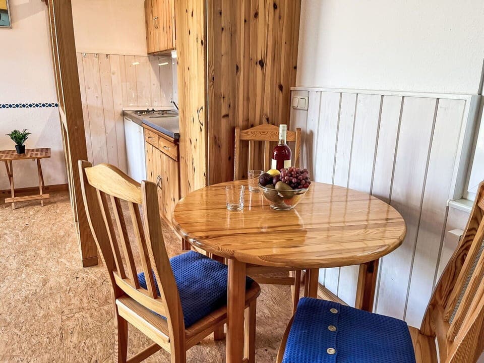 Furniture, Flooring, Wood, Interior Design, Floor, Table, Room, Dining Room, Wood Stain, Chair