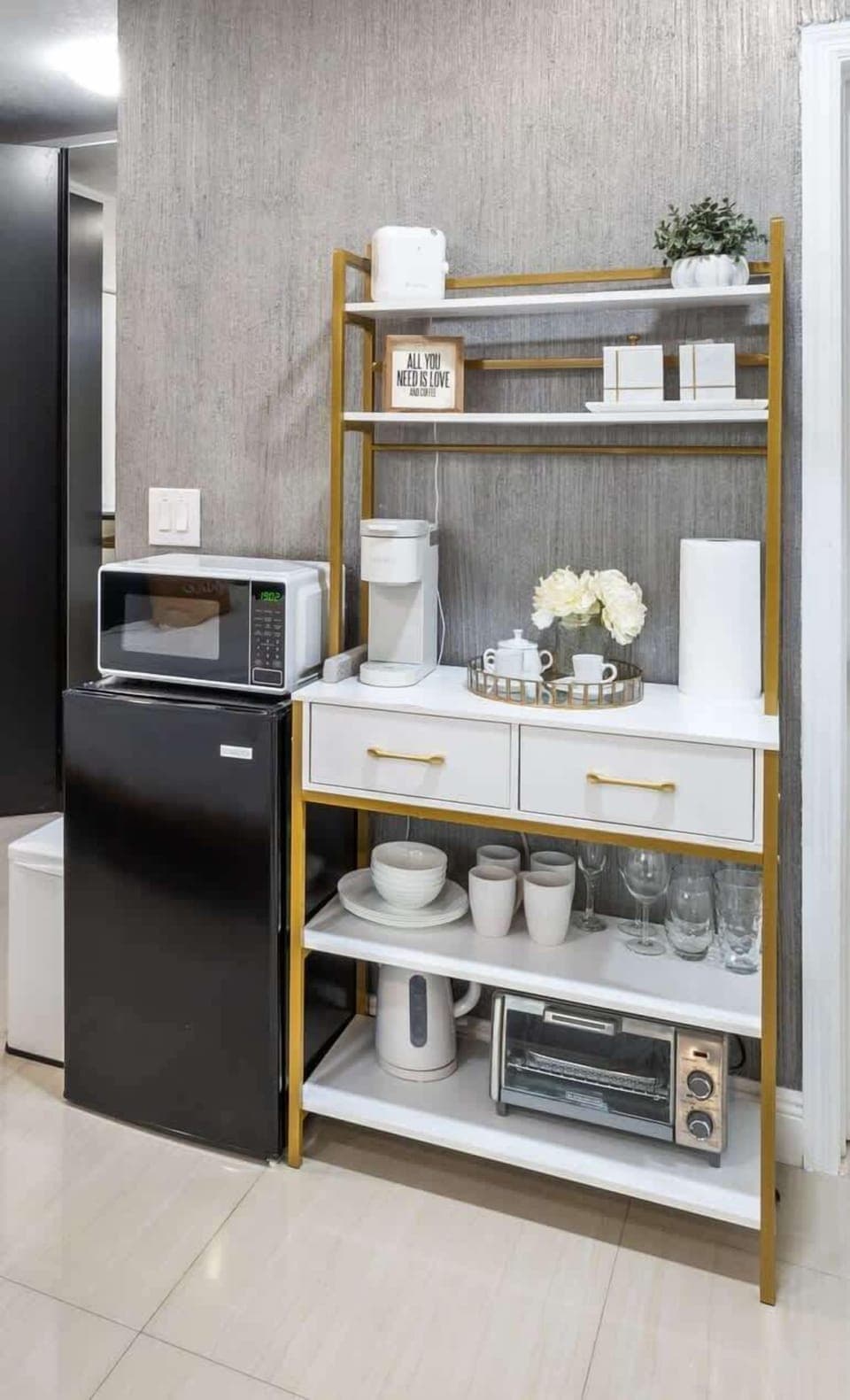 Kitchenette equipped with all essentials. Mini-fridge, microwave, coffee maker, tea-kettle, all-in-one toaster oven & airfryer.  Dining essentials, plates, bowls & silverware.  