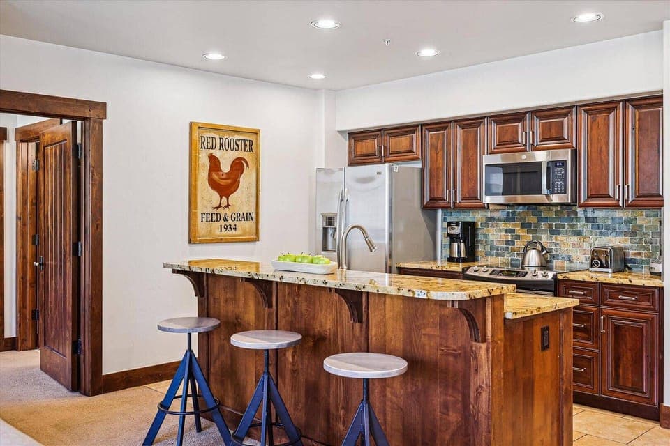 Fully Equipped Kitchen with Bar Stool Seating