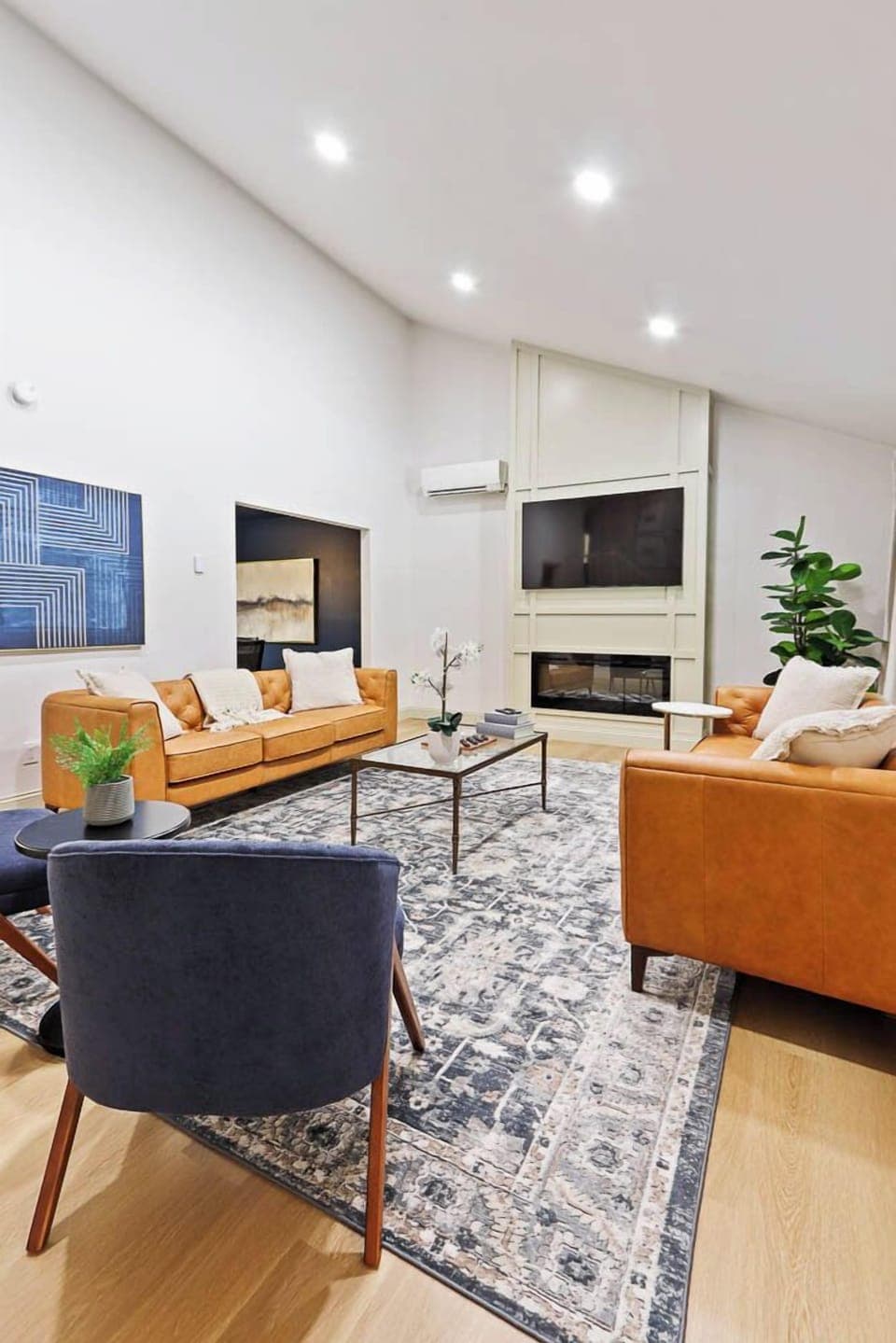 Centrally located, the living room flows effortlessly into the kitchen and dining areas, making it ideal for entertaining, socializing, or simply spending quality time together.