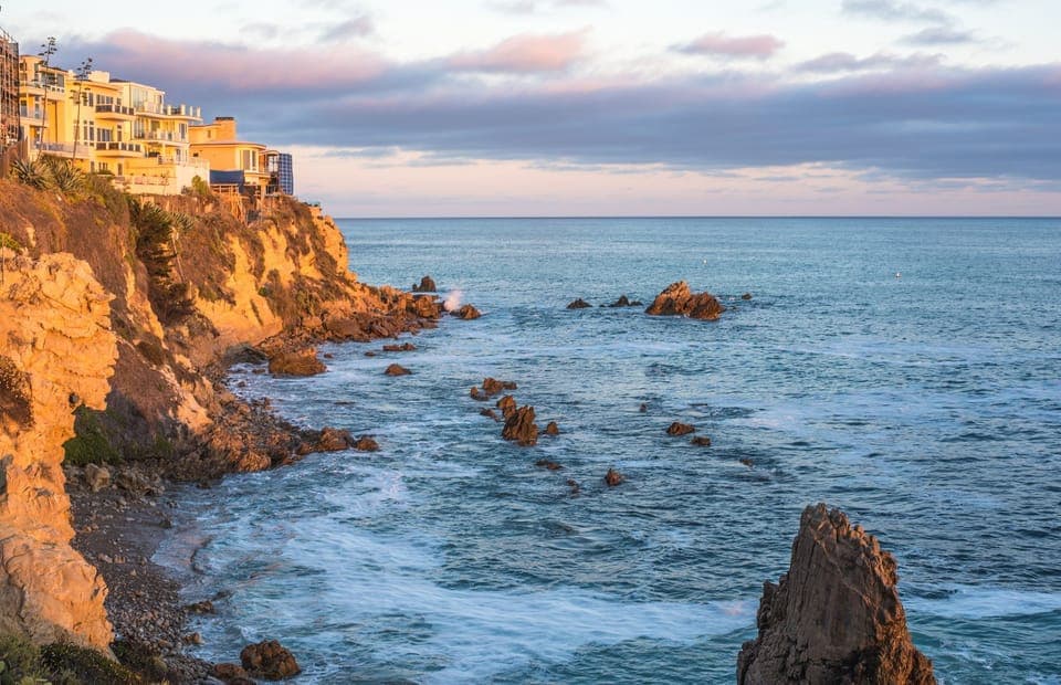Golden cliffs and tranquil coves make Corona del Mar one of Newport Beach’s most picturesque stretches of coast.
                