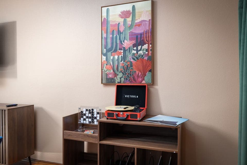 Our stylish wet bar is ready for your favorite drinks, while the board and card games on the side add a touch of fun and friendly competition. Perfect for creating memories with friends and family! 