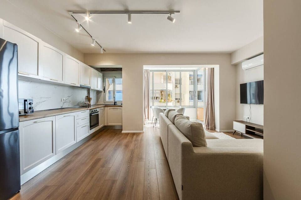 Living room and fully-equipped kitchen